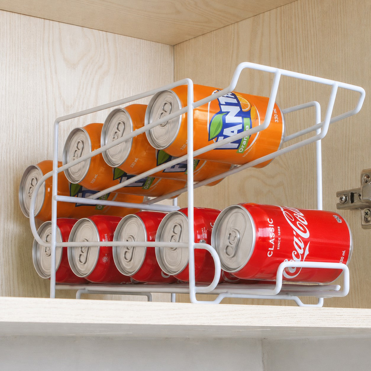 CanRoll double-layer white metal drink can organiser holding Coca-Cola and Fanta cans