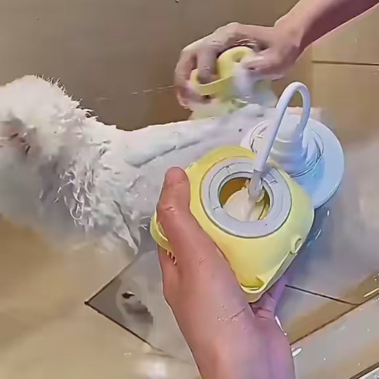 BubblePaw pet bath brush creating rich shampoo foam while washing a dog