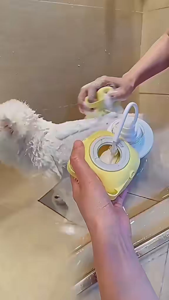 BubblePaw pet bath brush creating rich shampoo foam while washing a dog