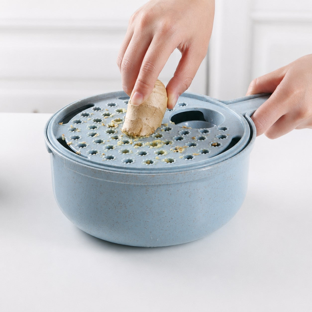 SliceMate blue vegetable slicer grating fresh ginger