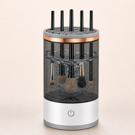 SpinGlow gray automatic makeup brush cleaner washing five makeup brushes in a rotating water vortex